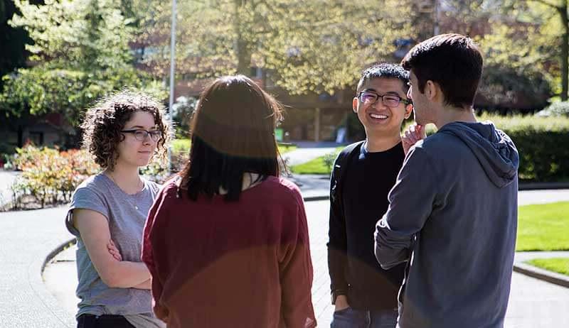 Students standing together and talking